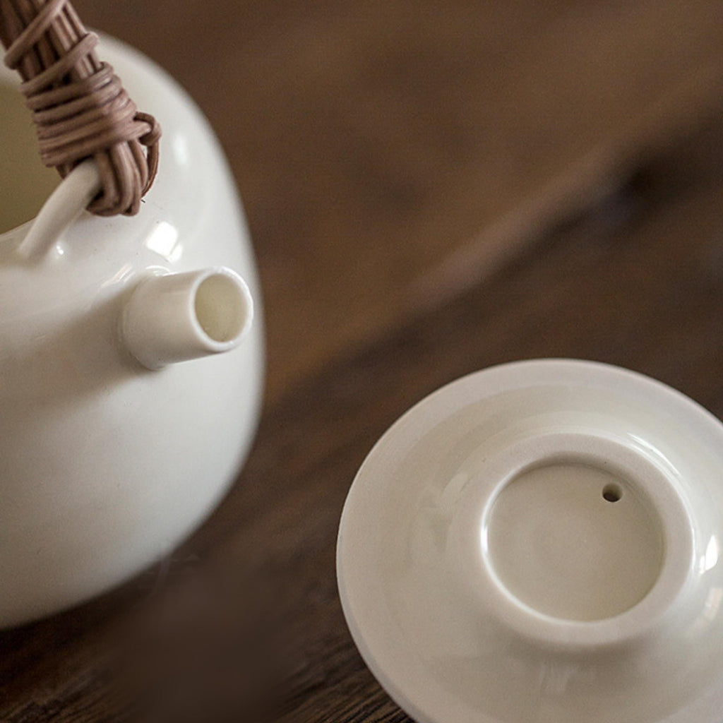 Rattan Handle Milky White Ceramic Kung Fu Teapot